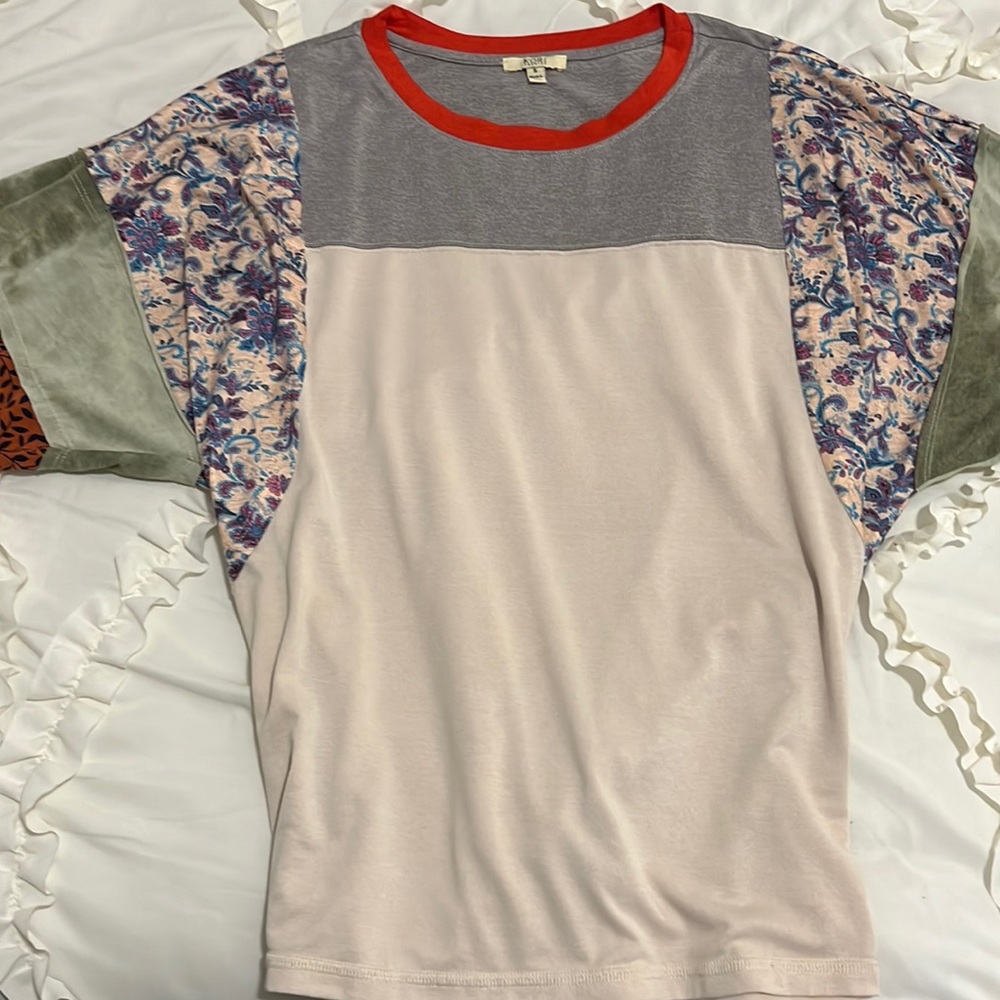 Fun shirt for spring with different fabrics and textures. Very comfy and so cute